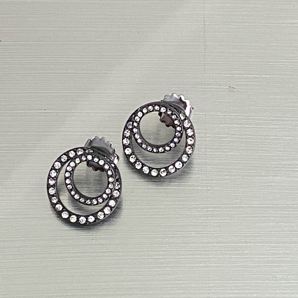 Black hoop earrings featuring clustered crystals